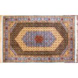 A PERSIAN SMALL CARPET, pale blue ground with central medallion and floral decoration. 9ft 5ins x