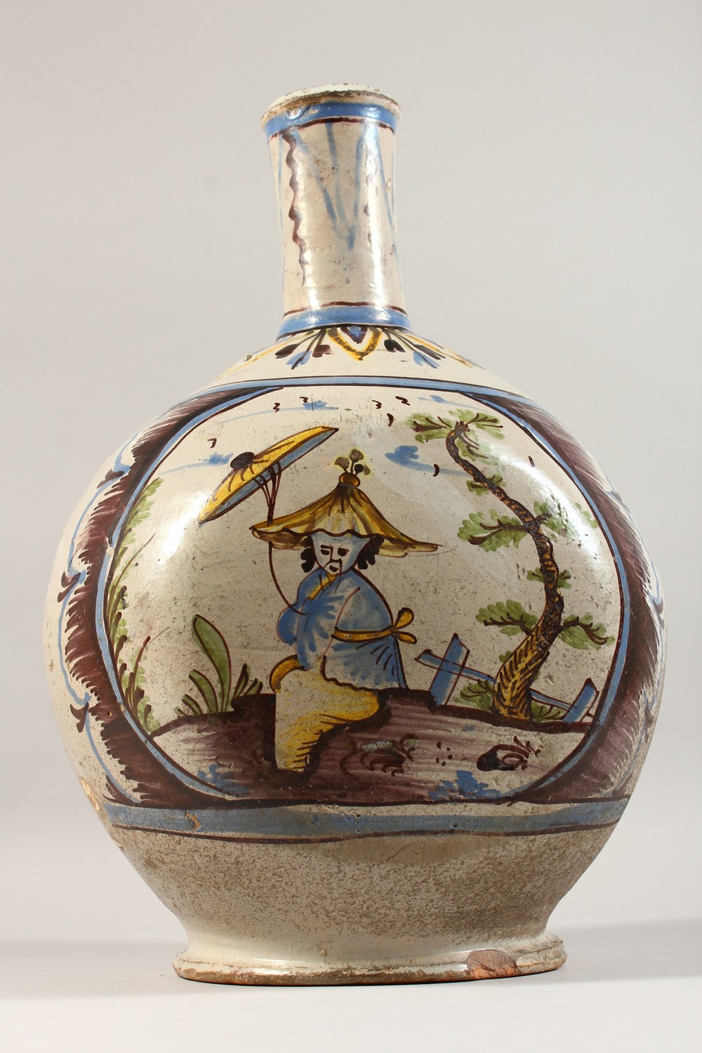 A LARGE CONTINENTAL POLYCHROME DECORATED TIN GLAZE FLASK, decorated with a Chinese figure and birds. - Image 4 of 10