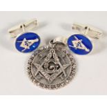 A PAIR OF SILVER AND ENAMEL CUFFLINKS AND FOB.