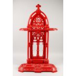 A VICTORIAN RED PAINTED IRON STICK STAND.