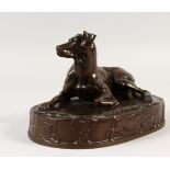CHARLES OUDIN. A BRONZE OF A DOG. Barbedienne Foundry. 9ins long.
