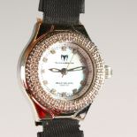 A TECHNO MARINE LADIES' STAINLESS STEEL WRISTWATCH, with mother-of-pearl dial and diamond bezel.