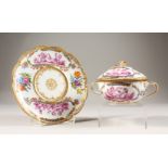 A MEISSEN STYLE TWIN HANDLED BOWL, COVER AND STAND, decorated with flowers and putti. Stand 7.5ins