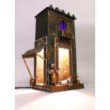 A VIENNA STYLE COLD PAINTED BRONZE LAMP, modelled as an Ark dwelling, with figures. 14ins high.