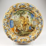 A LARGE ITALIAN MAJOLICA CHARGER with an allegorical scene. 18ins diameter.