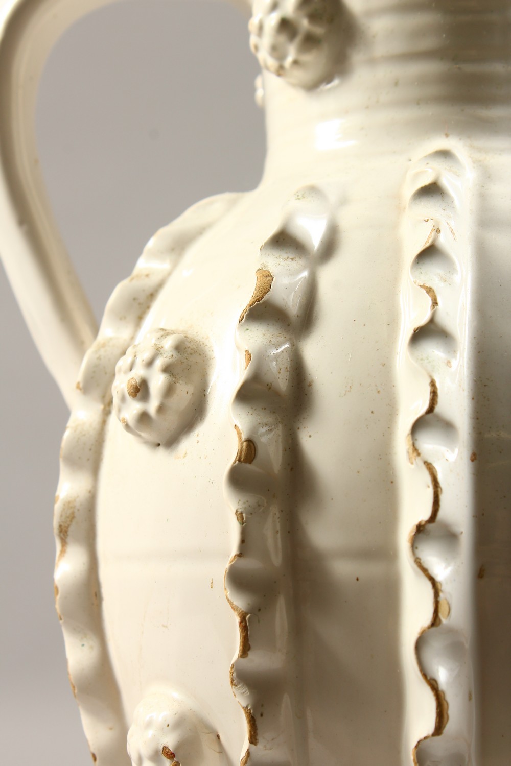 A 20TH CENTURY CONTINENTAL WHITE GLAZED TWIN HANDLED EARTHENWARE VASE, with ribbed decoration. 13ins - Image 2 of 10