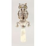 A NOVELTY SILVER OWL BABY'S RATTLE.