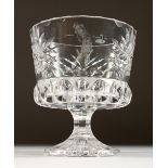 A CUT GLASS PEDESTAL BOWL, engraved with a golfer. 6.5ins high.