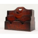 A 19TH CENTURY MAHOGANY SIX DIVISION STATIONERY RACK. 11ins wide.