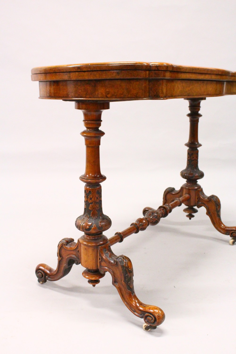 A GOOD VICTORIAN BURR WALNUT SHAPED TOP FOLDOVER CARD TABLE, with a pair of turned and carved column - Image 2 of 12