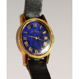 A MOVADO LADIES' WRISTWATCH with blue dial