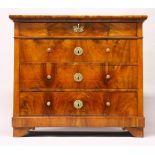 AN 18TH CENTURY CONTINENTAL WALNUT COMMODE, with four long drawers, with brass handles, on bracket