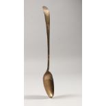 A GEORGE III TABLESPOON, London 1775. Maker SA. 11ins long.