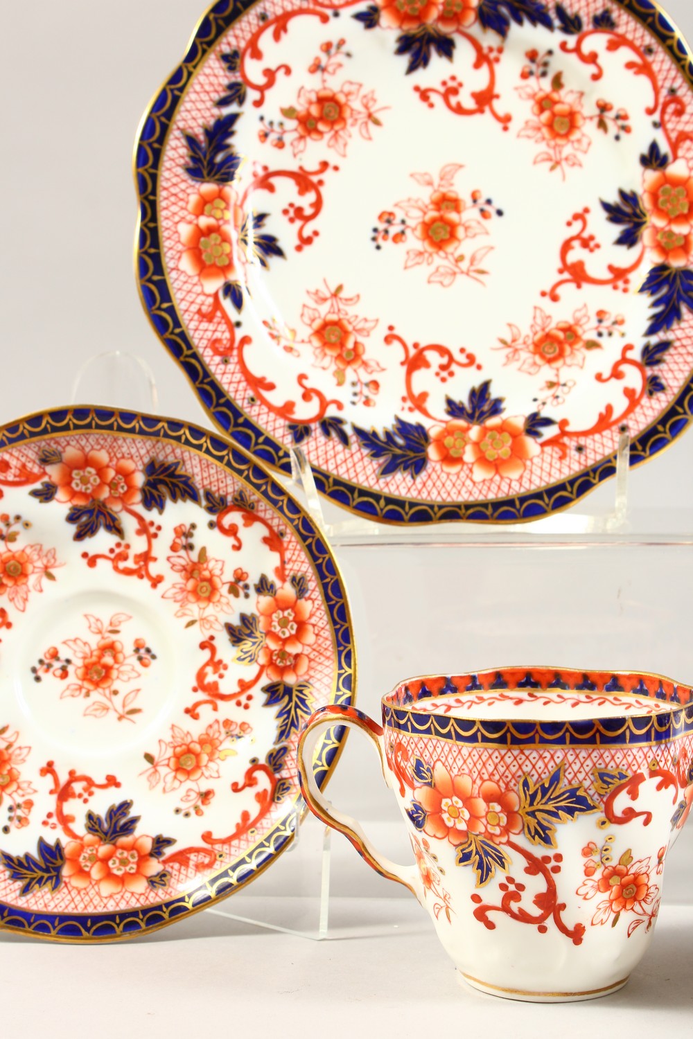 A COALPORT TRIO AND A HAMMERSLEY TRIO, blue and gilt painted with roses. - Image 2 of 7