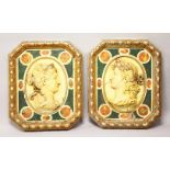 A PAIR OF ITALIAN CARVED WOOD, PAINTED AND GILDED PLAQUES OF ROMAN EMPERORS. 2ft 5ins x 2ft.