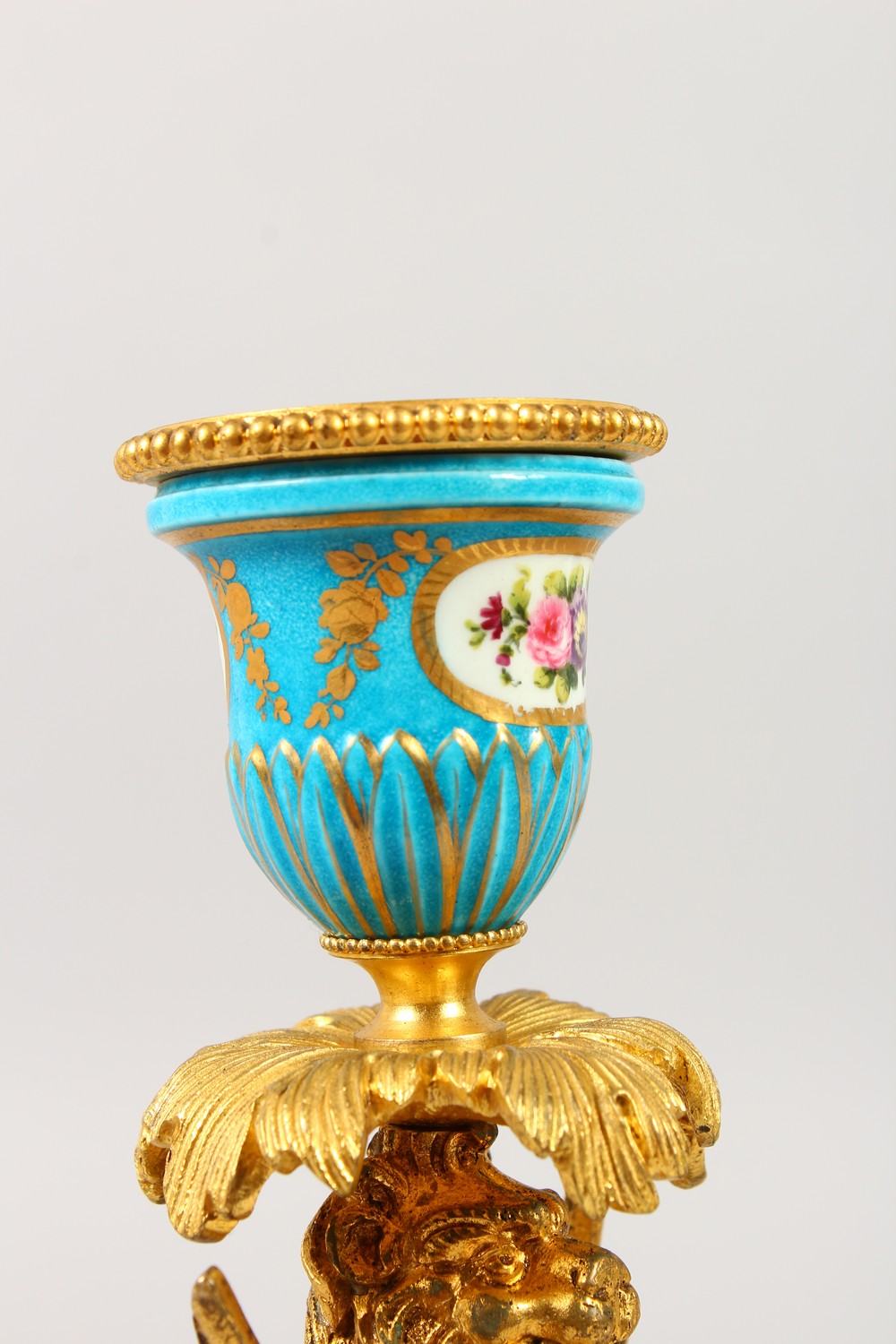 A GOOD PAIR OF FRENCH SEVRES PORCELAIN AND ORMOLU WINGED LION CANDLESTICKS. 9ins high. - Image 3 of 7