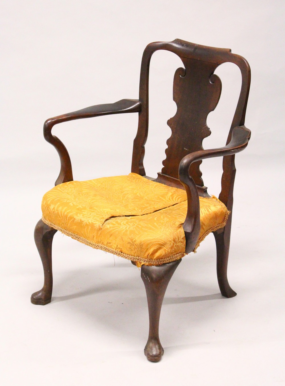 A GEORGE II/III MAHOGANY ARMCHAIR, with curving top rail, vase shaped splat, overstuffed seat on