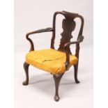 A GEORGE II/III MAHOGANY ARMCHAIR, with curving top rail, vase shaped splat, overstuffed seat on