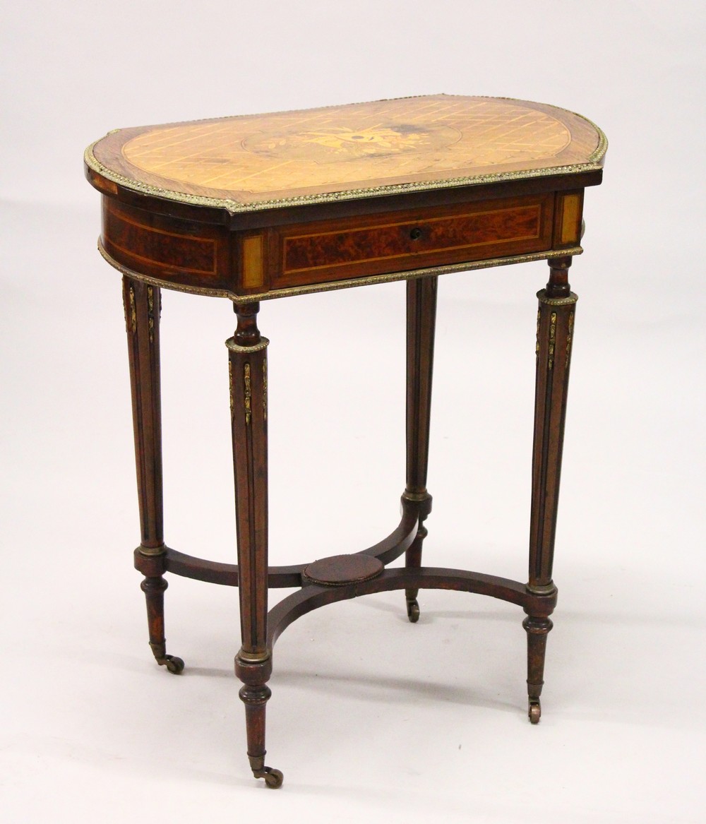 A 19TH CENTURY FRENCH KINGWOOD AND MARQUETRY INLAID DRESSING / WORK TABLE, the shaped rising top