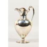 A .925 SILVER CLARET JUG.