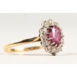 AN 18CT YELLOW GOLD, RUBY AND DIAMOND CLUSTER RING total weight 3 cts approx.