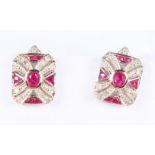 A PAIR OF 9CT GOLD RUBY AND DIAMOND EARRINGS.