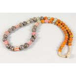 A LONG VENETIAN BEAD NECKLACE.