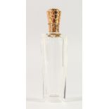 A CUT GLASS AND GOLD TOP SCENT BOTTLE.