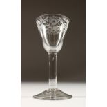 AN 18TH CENTURY "NEWCASTLE" WINE GLASS, with floral engraved band and plain stem. 6ins high.