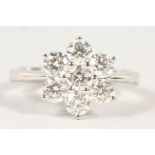 AN 18CT WHITE GOLD DIAMOND CLUSTER RING of 1.3cts.