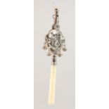 40A SILVER RATTLE with mother-of-pearl handle. 7ins long.