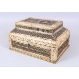 A GOOD 18TH / 19TH CENTURY RUSSIAN IVORY CASKET, the top with carved emblematic figures