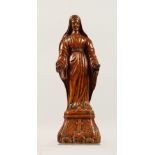 A LATE 19TH CENTURY SMALL CARVED BOXWOOD STANDING RELIGIOUS FIGURE. 8ins high.