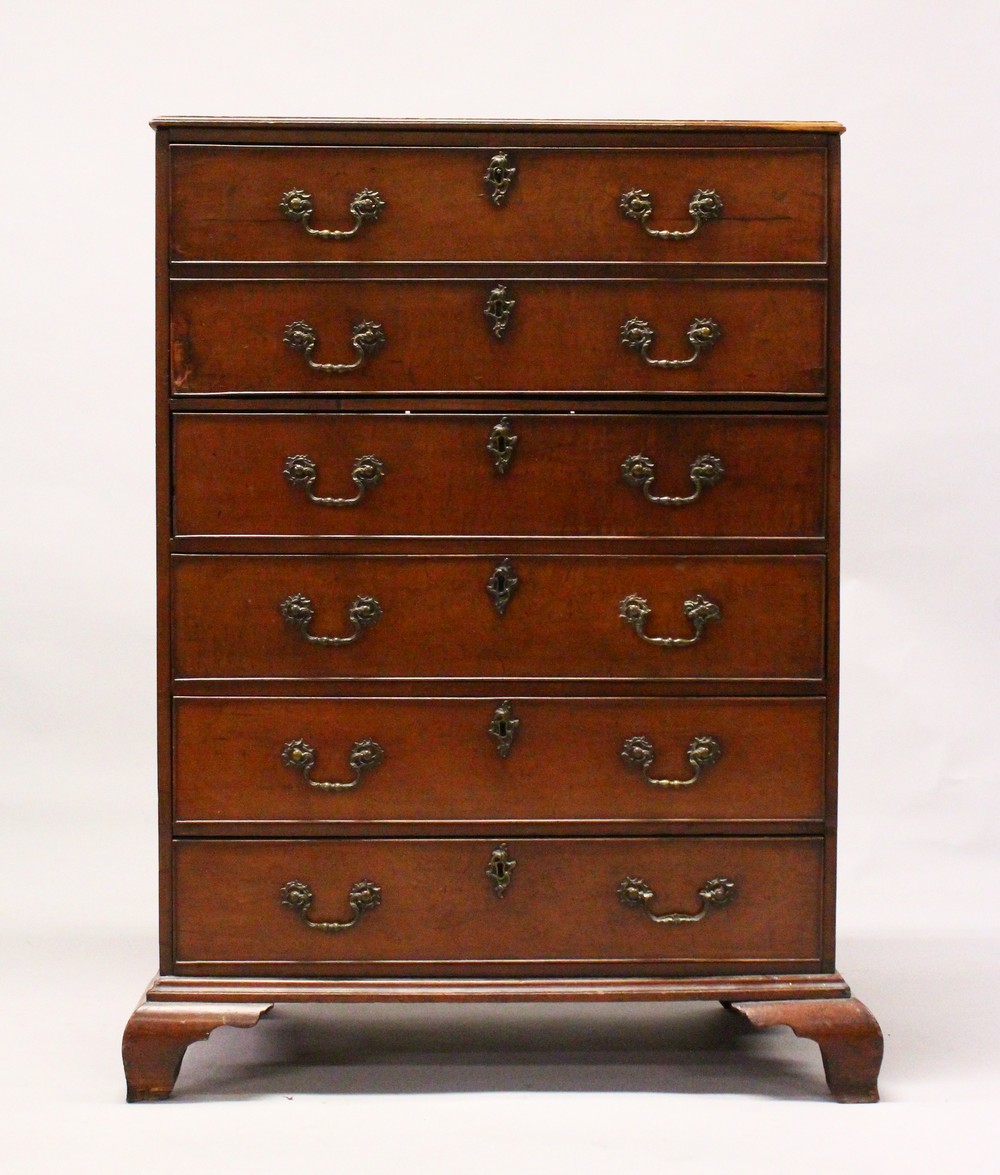 A GEORGE III MAHOGANY SECRETAIRE CHEST, the secretaire drawer fitted with small drawers, over four