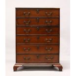 A GEORGE III MAHOGANY SECRETAIRE CHEST, the secretaire drawer fitted with small drawers, over four