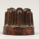 A SMALL COPPER JELLY MOULD. 4ins diameter.