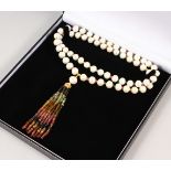 A SILVER, PEARL AND TOURMALINE TASSEL NECKLACE.