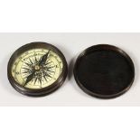 A BRONZE STANLEY OF LONDON COMPASS 1885, in a leather case.