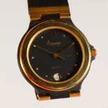 AN ASPREY LADIES' WRISTWATCH, with black dial.