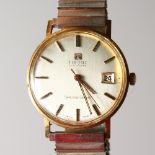 A TISSOT 9CT GOLD GENTLEMAN'S WRISTWATCH.