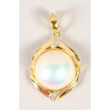 AN 18CT GOLD, DIAMOND AND PEARL PENDANT.