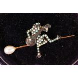 A 9CT GOLD AND SILVER OPAL AND DIAMOND FROG BROOCH.
