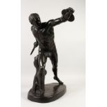 AFTER THE ANTIQUE. A LARGE CLASSICAL BRONZE OF A GLADIATOR carrying a sword and shield. 26ins high.