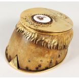 AN UNUSUAL RUSSIAN silver gilt stamp box, made from a horse's hoof, dated 1892, the silver gilt