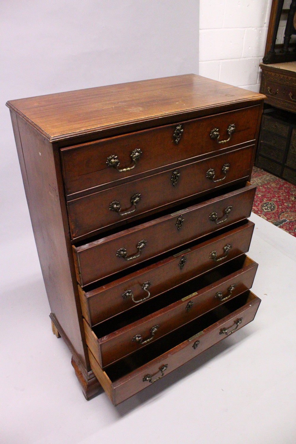 A GEORGE III MAHOGANY SECRETAIRE CHEST, the secretaire drawer fitted with small drawers, over four - Image 5 of 7