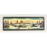 A RUSSIAN LACQUER BOX, decorated with a winter landscape. 10ins long.