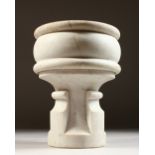 A CARVED WHITE MARBLE MORTAR, in the style of a font. 9ins high.
