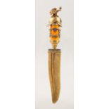 A GOOD RUSSIAN SILVER GILT, GEM SET AND ENAMEL PAPER KNIFE, with feather shape blade, the handle