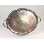 A LARGE TWIN HANDLED TRAY. 26ins wide.