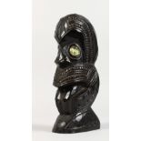 A MAORI CARVED WOOD HEAD with mother-of-pearl eyes. 8.5ins high.